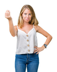Beautiful young woman over isolated background Doing Italian gesture with hand and fingers confident expression
