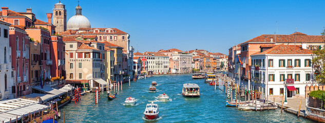 Grand canal with boat and gondola in Venice city, Italy, horizontal view. Medieval european...