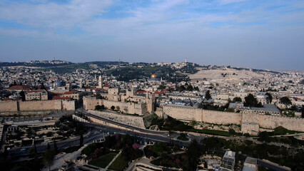 The old city of Jerusalem wall and David tower, aerial
Drone view from east Jerusalem old city and golden dome of the rock, may 2022 sunset
