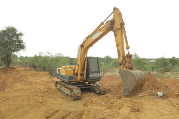 Fototapeta na wymiar Excavator at work in the site