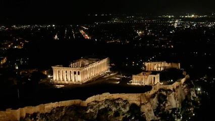 Greece Acropolis city in Athens, Drone night view, August 2022 
Drone view over Athen's city and ancient citadel, August 2022
