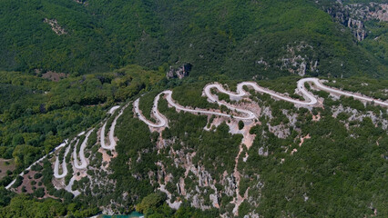 Vikos Gorge road near Voidomatis River, drone,2022
Drone view of road with many zigzag in the Epirus from Greece, 2022
