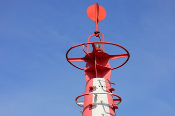 White and red turret against the blue sky © andsyphoto