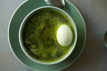 Photo of peruvian green soup. Concept of soups.