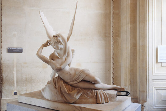 Paris, France - May 3, 2019: Psyche Revived by Cupid's Kiss, sculpture by Italian artist Antonio Canova exposed at the Louvre Museum.