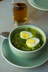 Photo of peruvian green soup. Concept of soups.