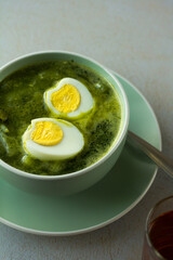 Photo of peruvian green soup. Concept of soups.