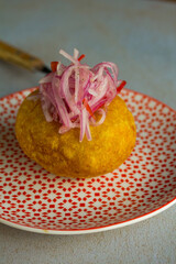 Stuffed potato, typical peruvian dish. Peruvian food concept.