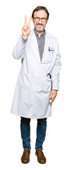 Fototapeta premium Middle age doctor men wearing medical coat showing and pointing up with fingers number two while smiling confident and happy.