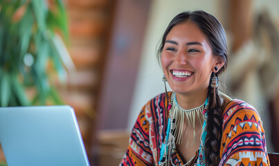Happy Native American Indian woman working remotely at laptop at home. Inclusion diversity & ethnic representation in workplace. Positive & flexible office culture
