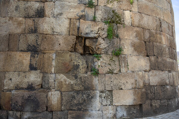 the fortress wall. A monument of ancient Persian fortification architecture. The background is made...