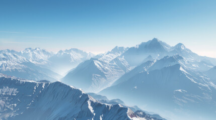 Obraz premium high-altitude drone photograph of snow-capped mountains under clear blue skies