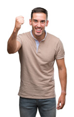 Naklejka premium Handsome young man annoyed and frustrated shouting with anger, crazy and yelling with raised hand, anger concept