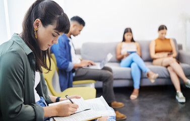 Job, interview and people in office or waiting room in lobby reading recruitment info and notes. Resume, woman or writing cv application in human resource reception or research vacancy opportunity