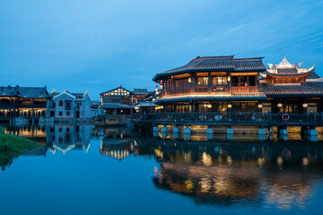 Naklejka premium At night, the beautiful ancient town of Lizhuang on the lake, Yibin City, Sichuan Province, China