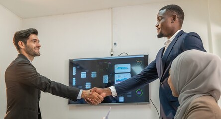 handshake after partnership meeting success business contract deal. Teamwork congratulate...
