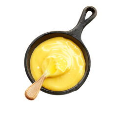 A photo of a bowl of cheese fondue with a wooden spoon.