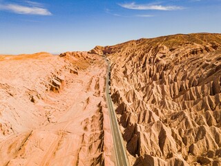 Salt Range, Atacama Desert, Chile. Highway that crosses a mountain range of salt mountains in the desert.
