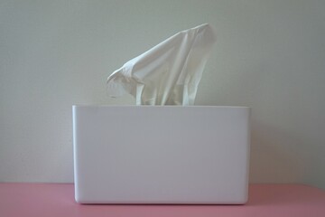 taking pulling white facial tissue out of from a white box for clean handkerchief. Healthcare...