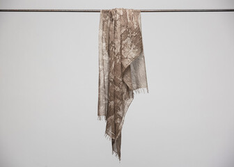 Hanging silk scarves display still life