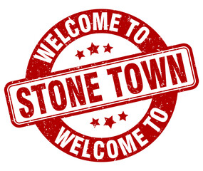 Welcome to Stone Town stamp. Stone Town round sign