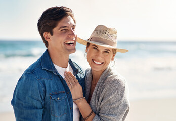 Couple hug, portrait and smile at beach for sunshine, holiday romance, love together and honeymoon....