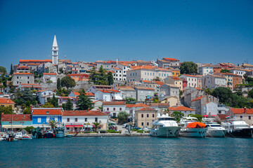 Picturesque coastal Croatia, Rovinj town viewed from water, featuring traditional architecture