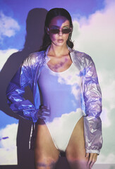 Swimwear, fashion and model with jacket on bikini for dream holiday or vacation in studio...