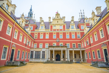 The baroque-style front entrance of the Chateau Bad Muskau in Saxony, showcasing its ornate...