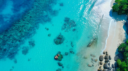 Aerial view of a sea with clear blue water in a tropical paradise. Drone like view of landscape. Panoramic view.