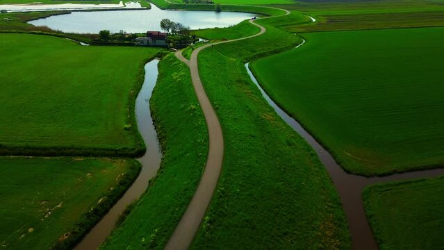 Dutch dijk near a small lake