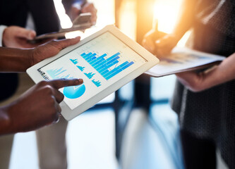 Tablet, screen and hands of business people with metrics, charts and graphs for productivity meeting. Data analysis, men and women with digital app for performance statistics, development or planning