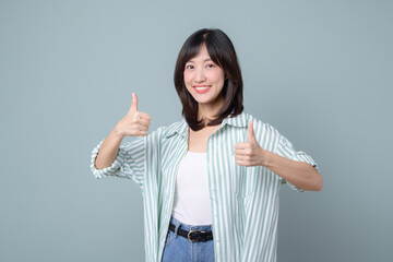 Very good. Smiling asian enterpriser woman showing okay with satisfied face expression, praise and...