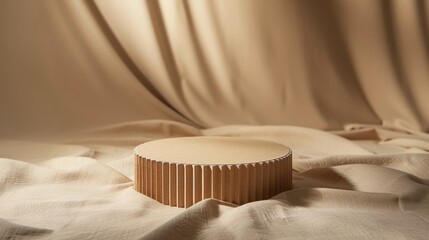 Corrugated cardboard podium atop a plain fabric surface, offering a clean and simple environment for showcasing affordable tech accessories