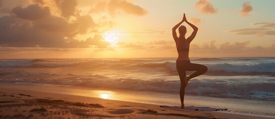A woman practices yoga on the beach at sunrise, demonstrating harmony and inner peace against a backdrop of crashing waves 1.