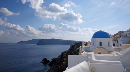 Mediterranean Architecture. Santorini Island, Greece. Oia town with Blue Dome Overlooking Aegean Sea
