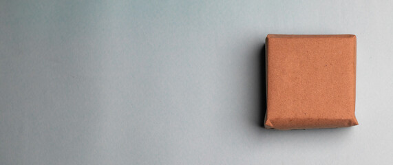 Gift box kept on a flat lay blue background