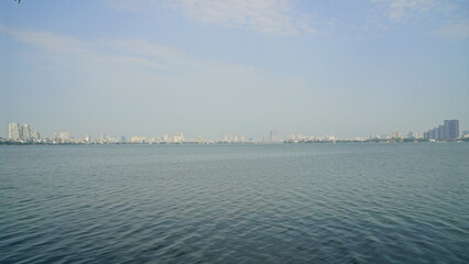City landscape next to a large lake
