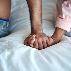 Couple, holding hands or closeup of support in home with empathy, compassion or connection on bed....