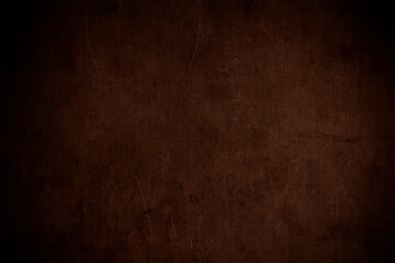 Textured dark brown vintage canvas or paper background with cracks and scratches.