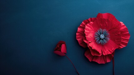 Simple red paper flower on a blue backdrop. Great for arts and crafts projects