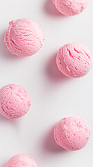 Bubble gum flavored ice cream scoops on white background
