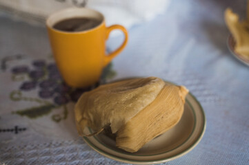 Delicious bread tamale, accompanied by tamarind atole, typical food from Uruapan, Michoacan, Mexico.
