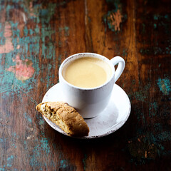 Cup of coffee on wooden background. Close up.	