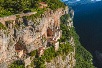 Aerial View of Madonna della Corona, Cliffside Sanctuary in Italy's Veneto, Surrounded by Dramatic Alpine Scenery