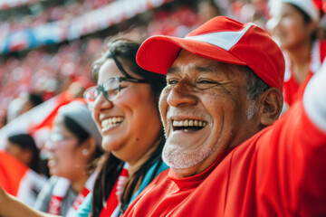 Peruvian football soccer fans in a stadium supporting the national team, La Blanquirroja
