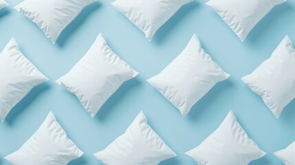 Pattern made of white pillow on serenity pastel blue background. Sleeping concept. Isometric flat lay