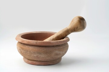 A mortar and wooden pestle in a clay bowl. Perfect for culinary or herbal medicine concepts - obrazy, fototapety, plakaty