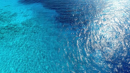 Fototapeta premium Aerial view of the blue sea surface