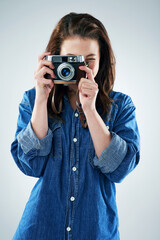 Woman, photographer and retro camera in studio for newspaper, magazine and job at media company....